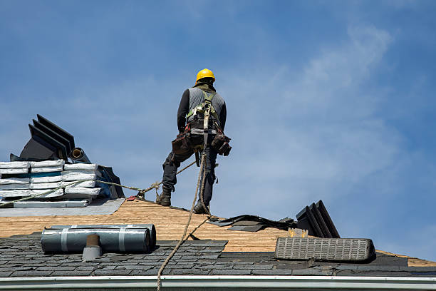 Professional Metal Roofing technician working in Raynham Center, MA